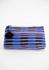 Large cosmetic bag handcrafted out of ethically sourced sheep's wool and Peruvian leather by artisans in Peru