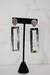 Black, white, and silver ethically-sourced cattle horn dangle earrings