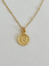 Minimalist gold necklace with a gold-plated butterfly charm on an 18k gold-filled chain