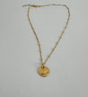 Minimalist gold necklace with a gold-plated songbird charm on an 18k gold-filled chain