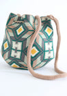 Green, tan, gray, yellow, and white hand-crocheted bucket bag