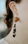 Large brown paper bead and black and cream resin teardrop dangle earrings