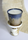 Hand-poured soy candle in a two-tone ceramic vessel