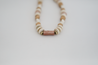 This stunning necklace features soft neutrals and semi-chunky eco-friendly recycled glass beads, making it both stylish and sustainable. Made in  Charlotte, North Carolina, USA