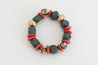 Handmade beaded stretch bracelet with red Ashanti recycled glass disc beads, multi-colored krobo beads, and olive green and gold wood beads