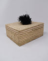 Hand-woven decorative and sustainably storage basket with fun pom pom on top