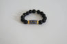 Black wood beads with Blue and Gold African Style Focus Bead.