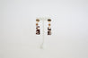 gold  andblack acrylic earring