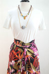 Black with. red, pink and green tropical print.