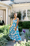 Blue dress with white leaf pattern,