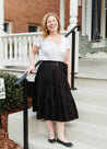 Black cotton midi wrap skirt with three tiers