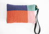 Colorful wristlet handwoven out of sheep's wool by indigenous artisans in Peru