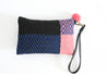 Colorful wristlet handwoven out of sheep's wool by indigenous artisans in Peru