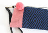 Colorful wristlet handwoven out of sheep's wool by indigenous artisans in Peru