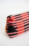 Large cosmetic bag handcrafted out of ethically sourced sheep's wool and Peruvian leather by artisans in Peru