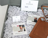 Gift set included a genuine leather phone crossbody bag with silver everyday hoop earrings and a $24 gift card to BraveWorks