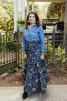 Festive wrap skirt with black background and colorful paisley and floral pattern sewn in the USA