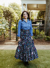 Festive wrap skirt with black background and colorful paisley and floral pattern sewn in the USA