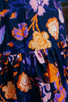 100% cotton vibrant navy, orange, and purple impressionist floral wrap skirt made in the USA