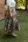 100% cotton wrap skirt with a brown, tan and lavender floral design sewn in the USA