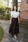 100% cotton wrap brown skirt with subtly brown floral pattern sewn in the USA