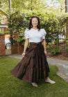 100% cotton wrap brown skirt with subtly brown floral pattern sewn in the USA