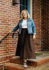 100% cotton wrap brown skirt with subtly brown floral pattern sewn in the USA