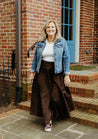 100% cotton wrap brown skirt with subtly brown floral pattern sewn in the USA