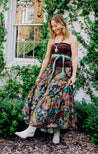 Soft, multicolor floral jewel tone wrap skirt against a navy background