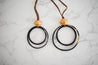 Handmade long leather cord necklaces with double circle pendant at bottom