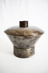 Decorative vessel with lid handmade out of recycled steel drums from Haiti