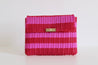 IXOQ recycled plastic clutch in Fuschia