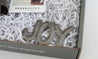 Gift set including an angel figurine and holiday ornaments handmade by artisans overcoming poverty and violence in Haiti