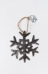 Ornament made from recycled steel drums in Haiti