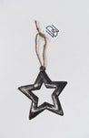 Ornament made from recycled steel drums in Haiti