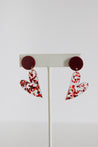 Lightweight fall earrings featuring translucent heart charms and autumn confetti design.