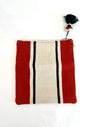 Foldover clutch bag handcrafted out of sheep's wool and leather by artisans in Peru