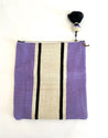 Foldover clutch bag handcrafted out of sheep's wool and leather by artisans in Peru