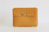 Recycled plastic clutch in the color lemon, yellow.