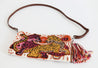 Pink, orange, yellow, and tan tapestry clutch/crossbody with leopard design