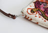 Pink, orange, yellow, and tan tapestry clutch/crossbody with leopard design