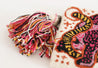 Pink, orange, yellow, and tan tapestry clutch/crossbody with leopard design