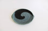 Sustainable decor for serving trays or wall art in black and blue.