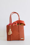 Recycled plastic medium size tote in the color terracotta.