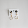 Feminine dangle earrings with two types of pearl beads and a resin topper