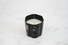 Hand-poured soy candle in a cattle horn vessel