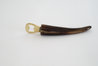 Branded bottle opener handmade from ethically-sourced cattle horn with gold hardware