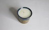 Hand-poured soy candle in a two-tone ceramic vessel