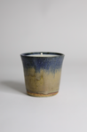 Hand-poured soy candle in a two-tone ceramic vessel