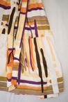 Modern Geometric maxi wrap skirt with orange, purple, tan, and ivory colors
